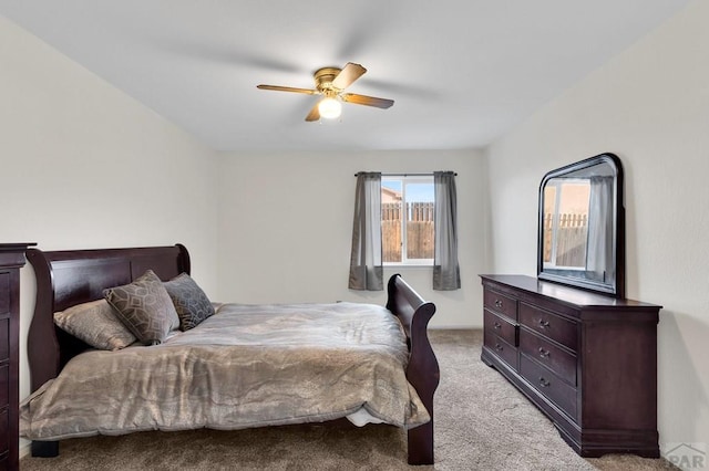 bedroom with light colored carpet and ceiling fan