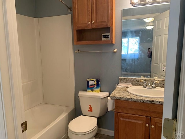 bathroom featuring shower / bath combination, vanity, and toilet