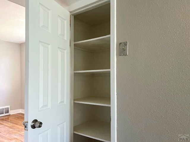 closet featuring visible vents