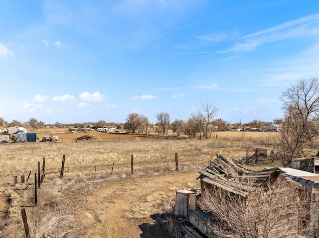 1040 28th Ln, Pueblo, CO 81006 - view of yard featuring a rural view and fence