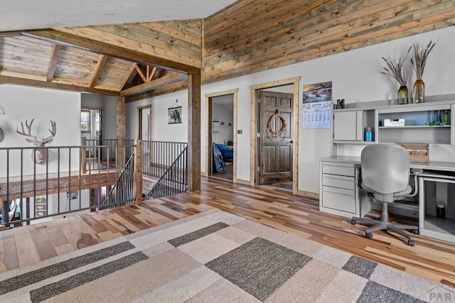 5010 Oak Grove Cir, Westcliffe, CO 81252 - office area with high vaulted ceiling, wooden ceiling, beam ceiling, and wood finished floors