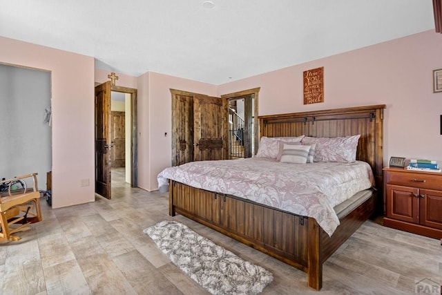 5010 Oak Grove Cir, Westcliffe, CO 81252 - bedroom featuring light wood finished floors and a closet