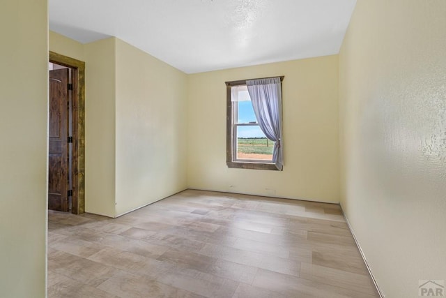 5010 Oak Grove Cir, Westcliffe, CO 81252 - empty room with light wood finished floors