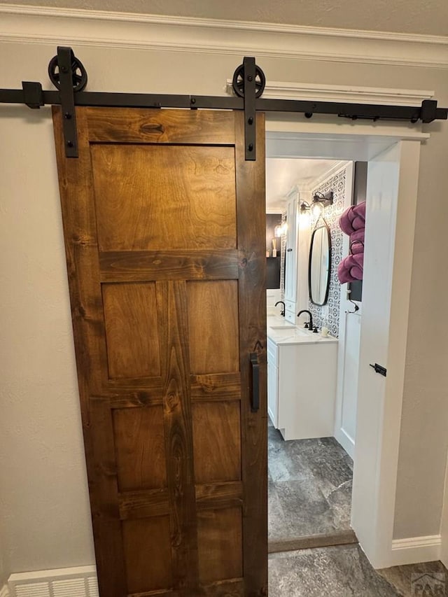 303 S Animas St, Trinidad, CO 81082 - bathroom featuring vanity and baseboards
