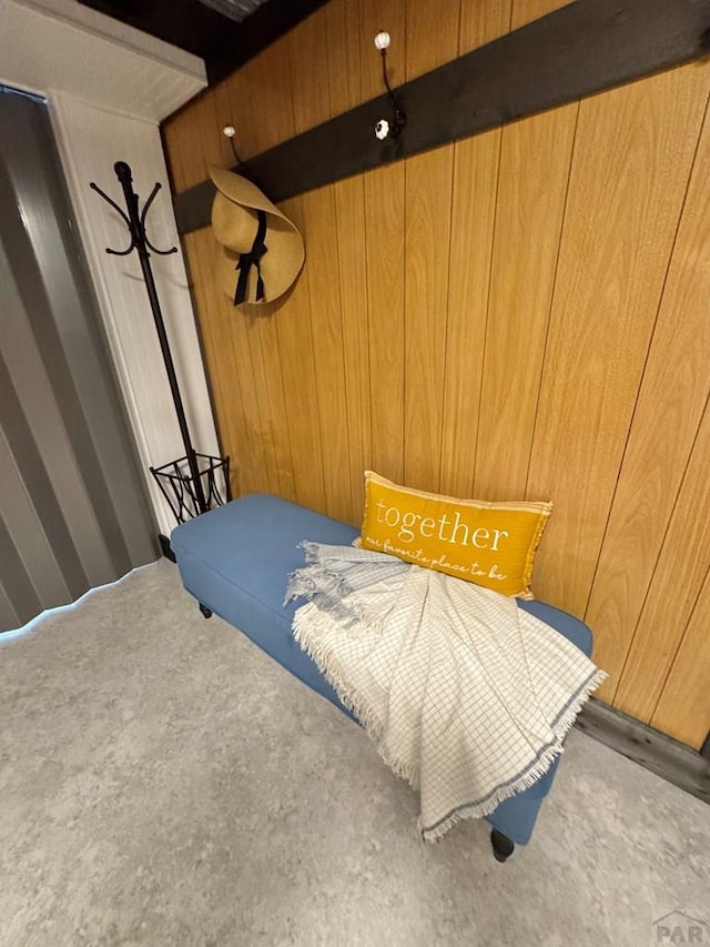 303 S Animas St, Trinidad, CO 81082 - carpeted bedroom featuring wood walls