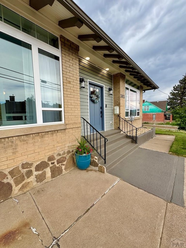 303 S Animas St, Trinidad, CO 81082 - view of exterior entry featuring brick siding