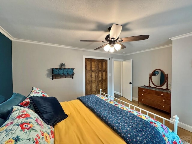 303 S Animas St, Trinidad, CO 81082 - bedroom with ornamental molding and a ceiling fan