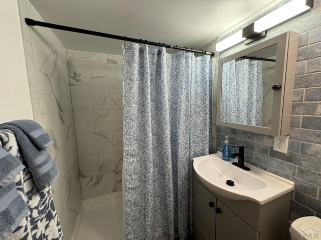 303 S Animas St, Trinidad, CO 81082 - bathroom with vanity and a shower with shower curtain