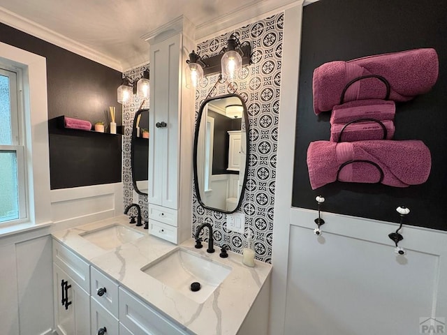 303 S Animas St, Trinidad, CO 81082 - bathroom with double vanity and ornamental molding