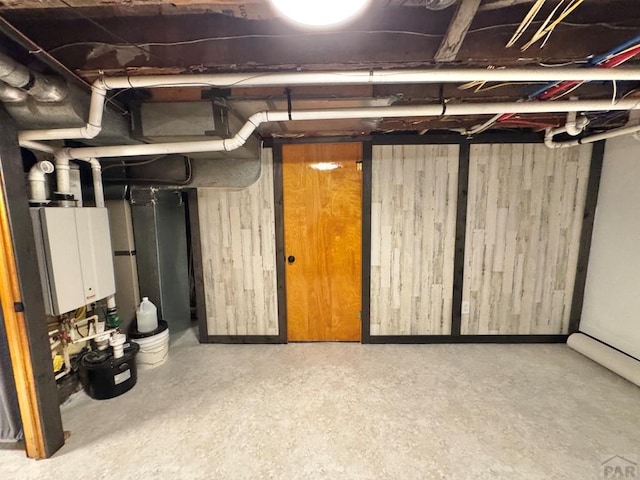 303 S Animas St, Trinidad, CO 81082 - unfinished basement featuring water heater and gas meter