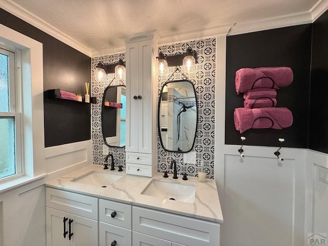 303 S Animas St, Trinidad, CO 81082 - full bath featuring crown molding and double vanity