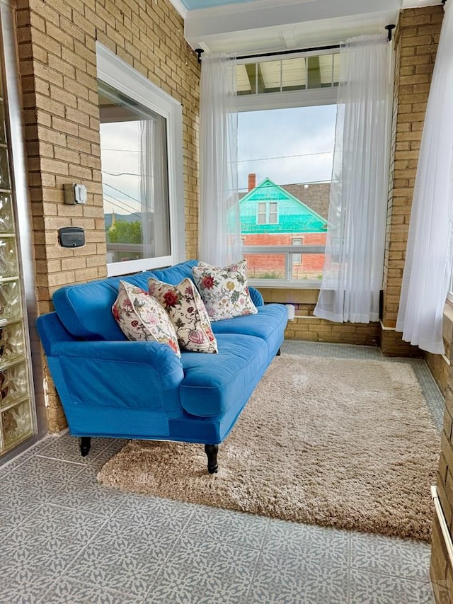 303 S Animas St, Trinidad, CO 81082 - living area with brick wall