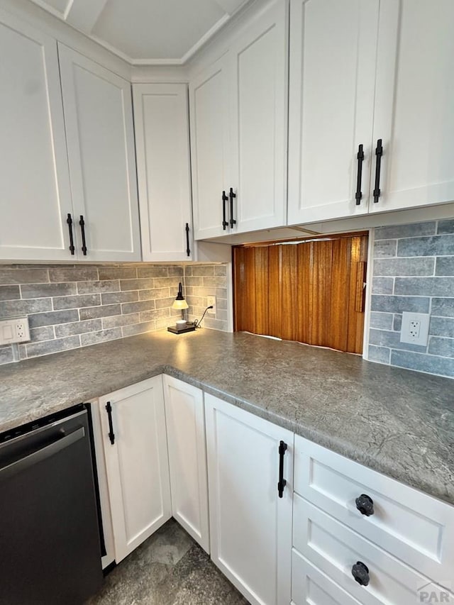 303 S Animas St, Trinidad, CO 81082 - kitchen with dishwashing machine, white cabinets, and backsplash