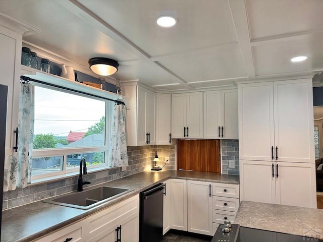 303 S Animas St, Trinidad, CO 81082 - kitchen featuring black dishwasher, backsplash, white cabinets, coffered ceiling, and recessed lighting