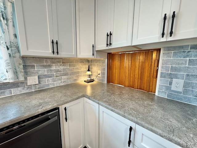 303 S Animas St, Trinidad, CO 81082 - kitchen featuring dishwasher, white cabinetry, and backsplash