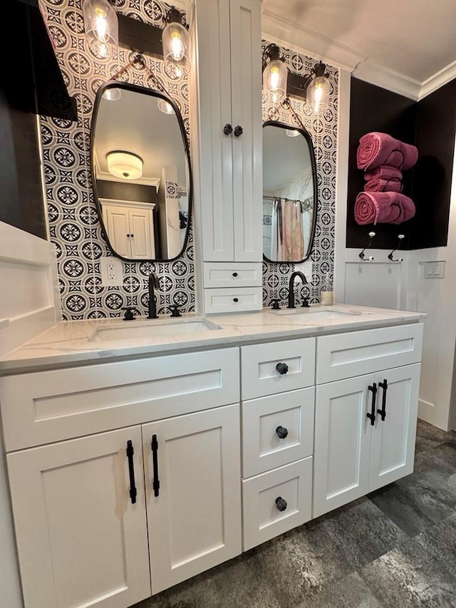 303 S Animas St, Trinidad, CO 81082 - bathroom featuring double vanity and ornamental molding