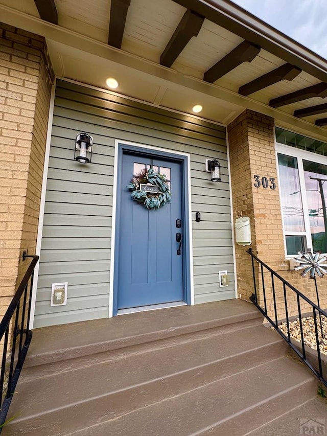 303 S Animas St, Trinidad, CO 81082 - property entrance featuring brick siding
