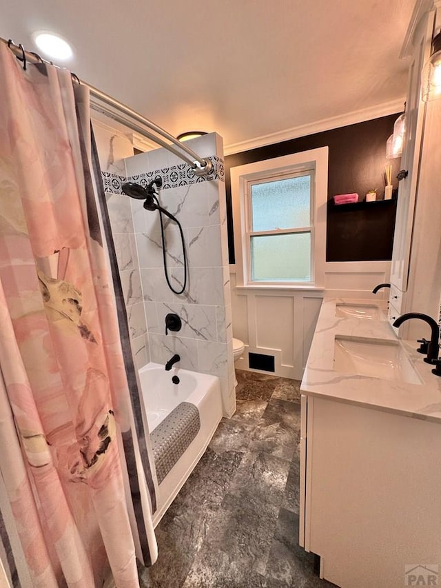 303 S Animas St, Trinidad, CO 81082 - bathroom with double vanity, shower / bathtub combination with curtain, and ornamental molding