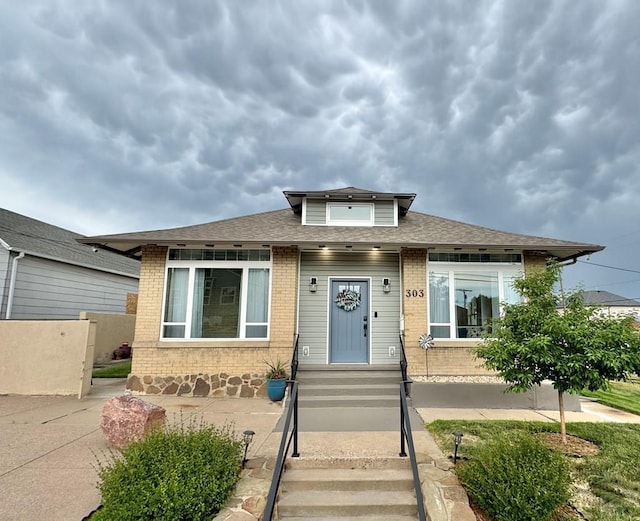 303 S Animas St, Trinidad, CO 81082 - bungalow-style house with brick siding and a shingled roof