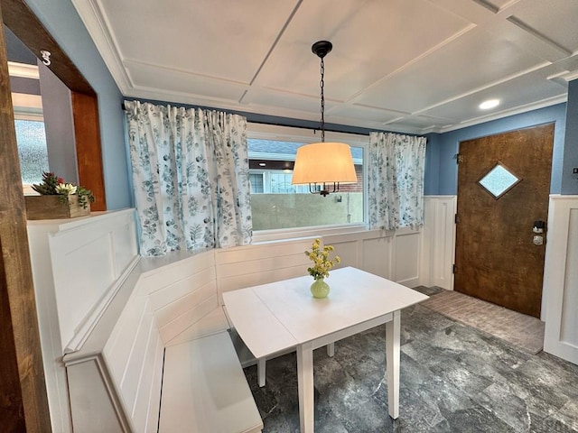 303 S Animas St, Trinidad, CO 81082 - dining space featuring a wainscoted wall