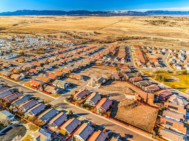 birds eye view of property featuring a residential view and a mountain view