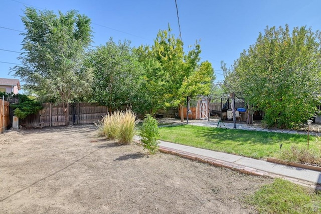 view of yard featuring a fenced backyard