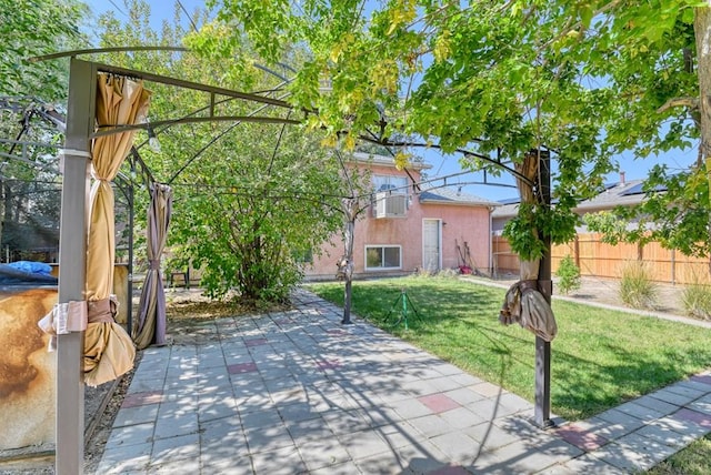 view of patio with fence