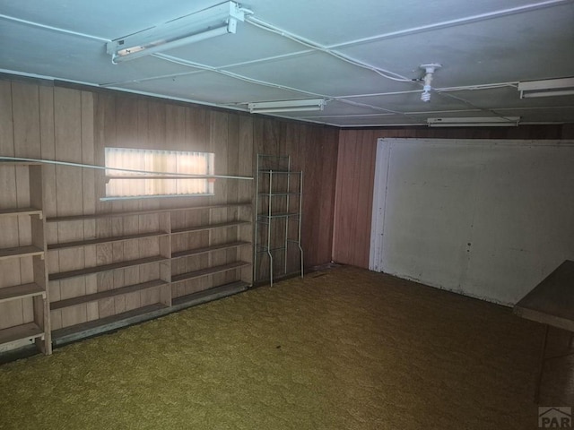 1122 Raton Ave, La Junta, CO 81050 - garage featuring wood walls