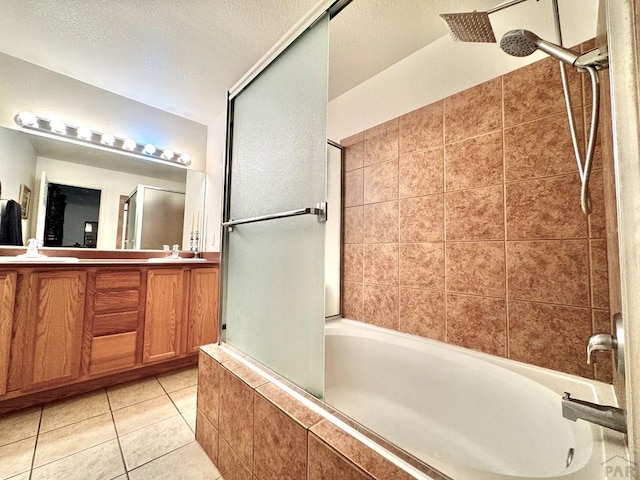 4147 Outlook Blvd Unit F, Pueblo, CO 81008 - full bathroom with double vanity, tiled shower / bath combo, a sink, and tile patterned flooring