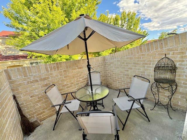 4147 Outlook Blvd Unit F, Pueblo, CO 81008 - view of patio / terrace featuring fence
