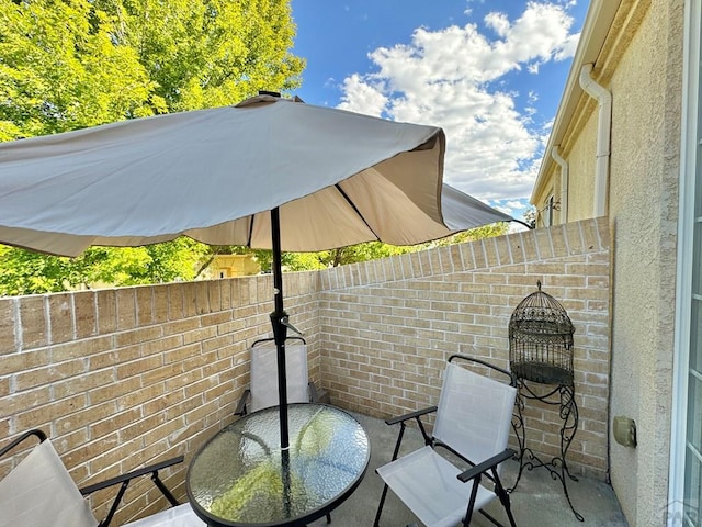 4147 Outlook Blvd Unit F, Pueblo, CO 81008 - view of patio / terrace with fence