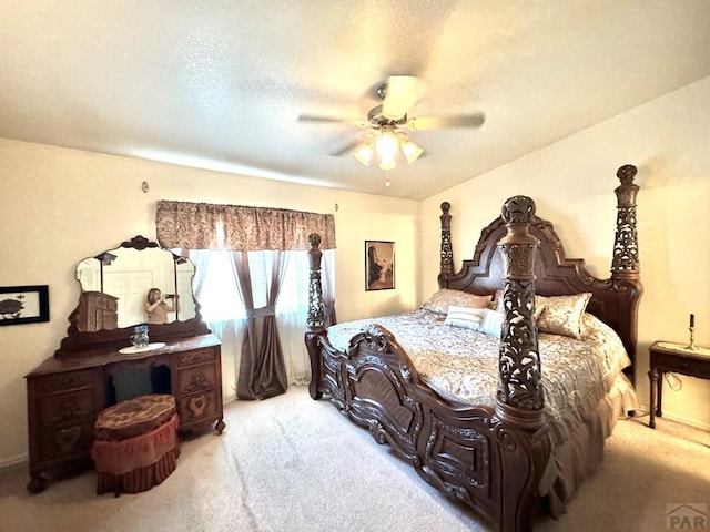 4147 Outlook Blvd Unit F, Pueblo, CO 81008 - carpeted bedroom with a textured ceiling and ceiling fan