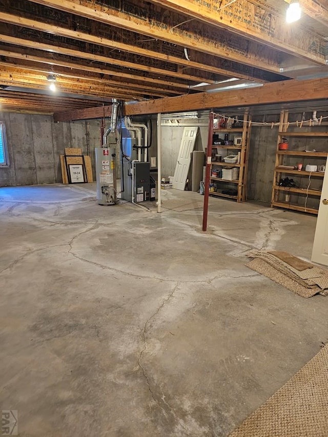 unfinished basement featuring water heater