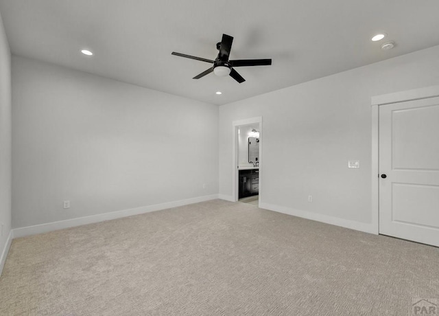 unfurnished room with baseboards, ceiling fan, light colored carpet, and recessed lighting