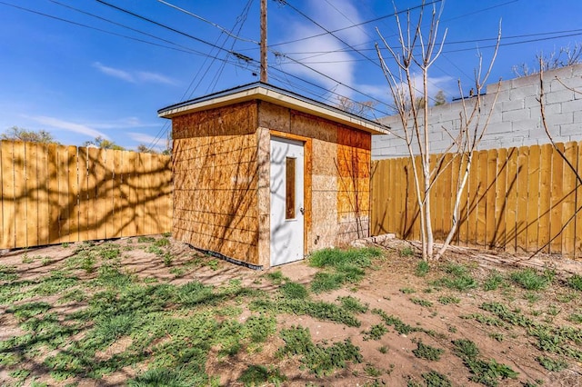 1131 Pine St, Pueblo, CO 81004 - view of outbuilding with a fenced backyard and an outbuilding
