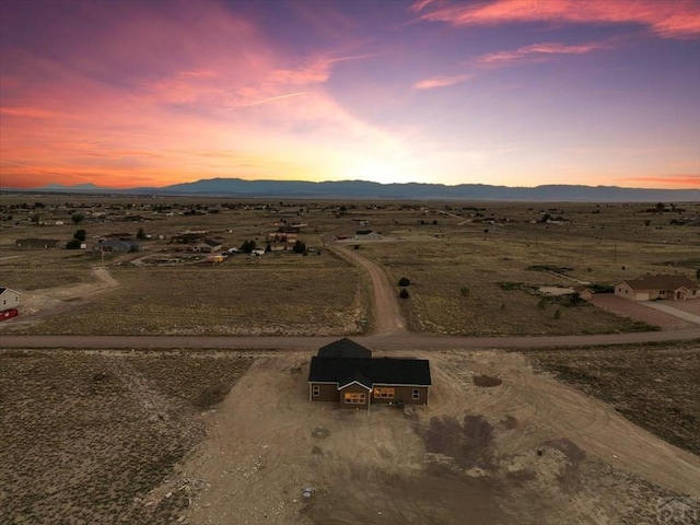 aerial view with a rural view and a mountain view