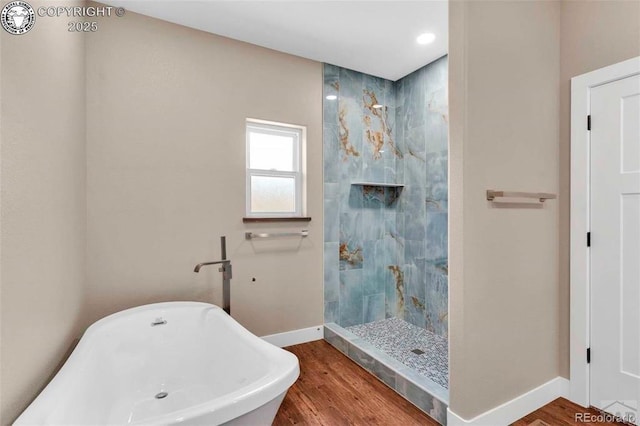3010 Grandview Ave, Canon City, CO 81212 - bathroom featuring tiled shower, a freestanding tub, wood finished floors, and recessed lighting