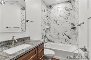 3010 Grandview Ave, Canon City, CO 81212 - full bathroom featuring vanity and shower / bath combination