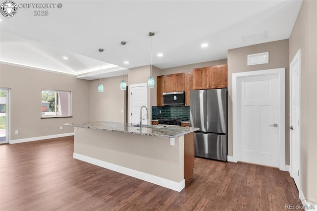 3010 Grandview Ave, Canon City, CO 81212 - kitchen with appliances with stainless steel finishes, dark wood-type flooring, brown cabinetry, decorative backsplash, and recessed lighting
