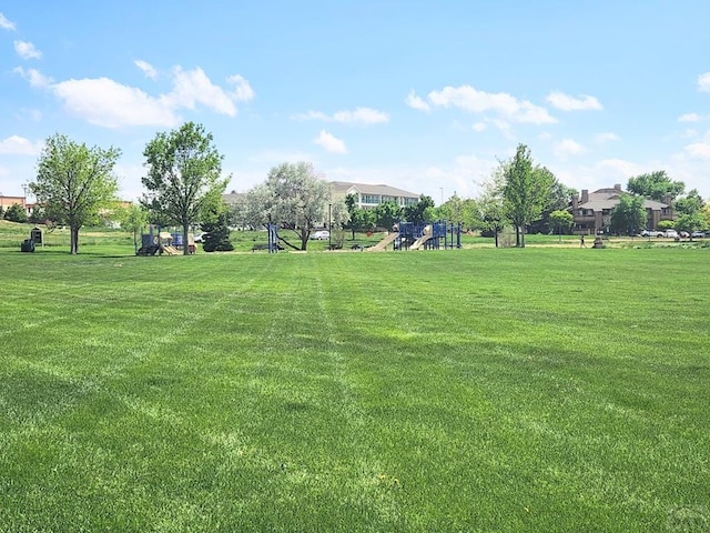 3666 Iguana Dr, Colorado Springs, CO 80910 - view of property's community featuring a lawn