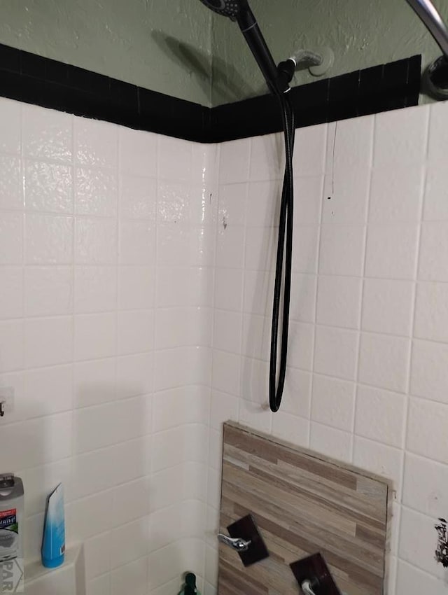 bathroom with a shower