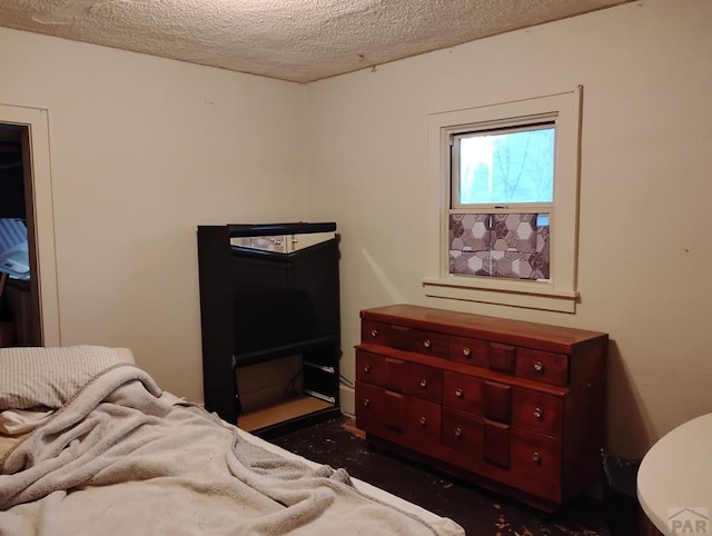 bedroom with a textured ceiling