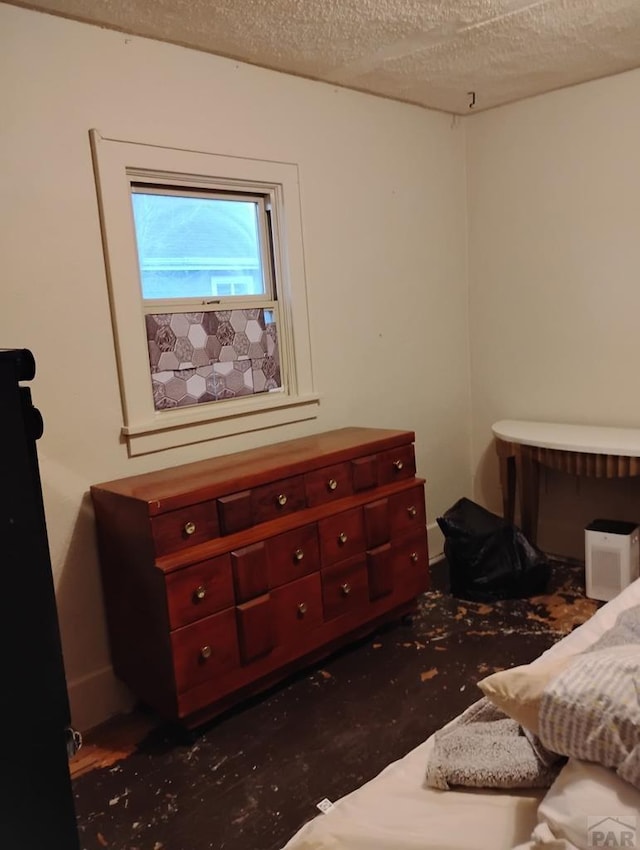 bedroom with a textured ceiling