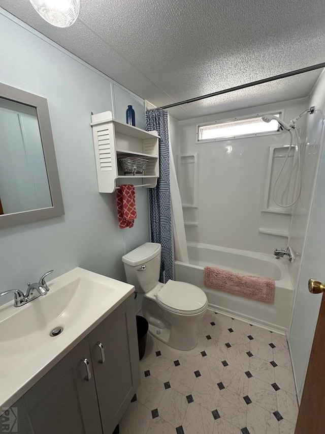 full bath featuring toilet, vanity, tile patterned floors, a textured ceiling, and shower / bathtub combination with curtain