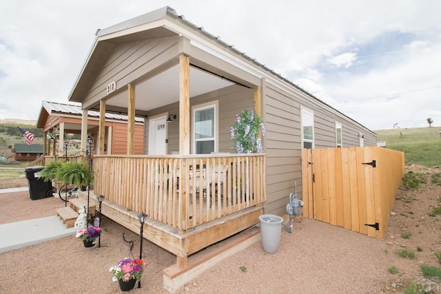 218 W Thurlow Ave, Cripple Creek, CO 80813 - view of front facade with a porch and metal roof