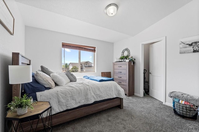 carpeted bedroom with baseboards