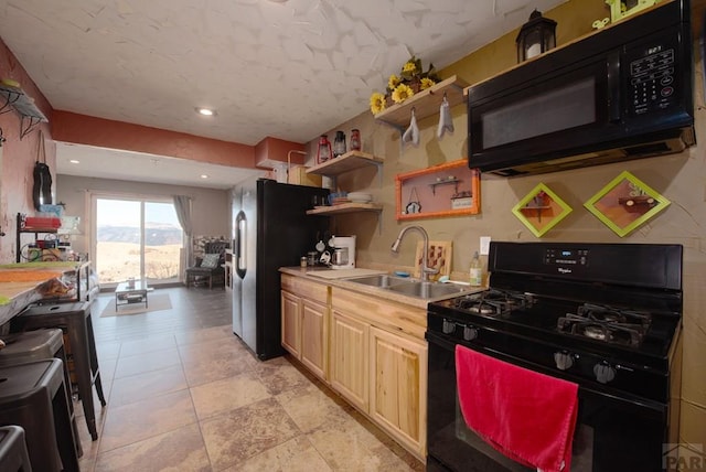 1160 Diamond Black Trl, Canon City, CO 81212 - kitchen with open shelves, a sink, light countertops, light brown cabinetry, and black appliances