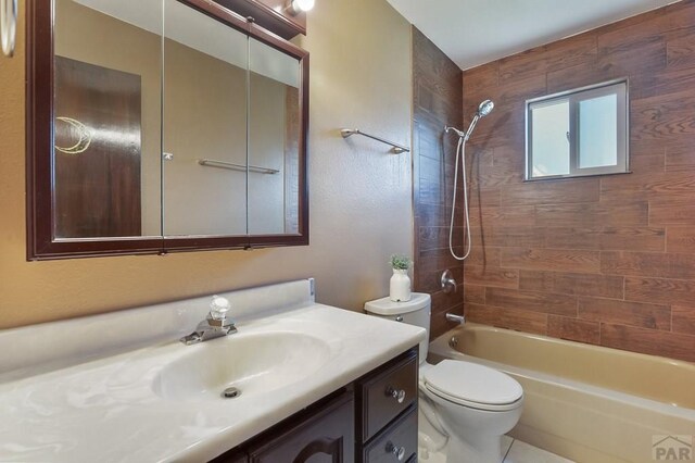 118 W Stanley Ave, Canon City, CO 81212 - full bathroom featuring toilet, shower / washtub combination, and vanity
