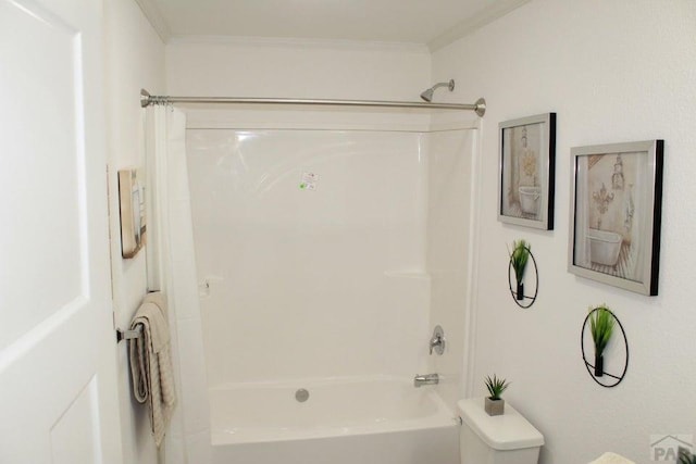 bathroom with crown molding, toilet, and shower / bathtub combination with curtain