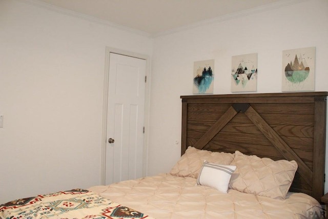 bedroom with ornamental molding